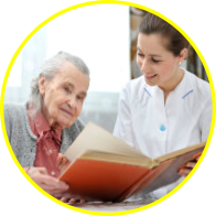 Caregiver and elder reading book