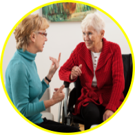 Caregiver and elder talking